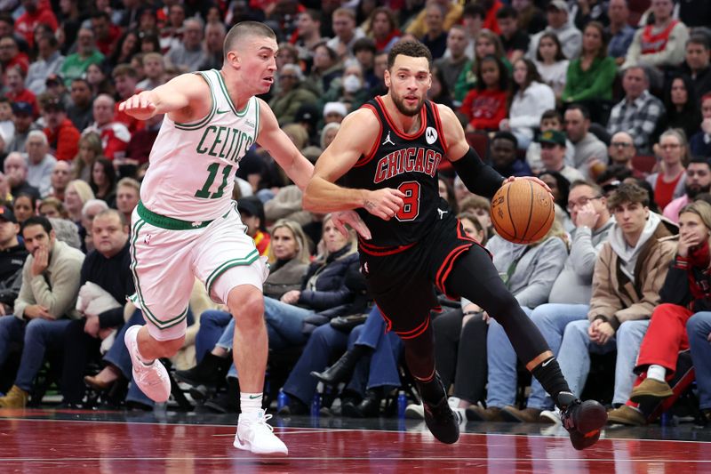 CHICAGO, ILLINOIS - NOVEMBER 29: Zach LaVine #8 of the Chicago Bulls drives to the basket against Payton Pritchard #11 of the Boston Celtics during the third quarter of the Emirates NBA Cup game at the United Center on November 29, 2024 in Chicago, Illinois. NOTE TO USER: User expressly acknowledges and agrees that, by downloading and or using this photograph, User is consenting to the terms and conditions of the Getty Images License Agreement.  (Photo by Luke Hales/Getty Images)