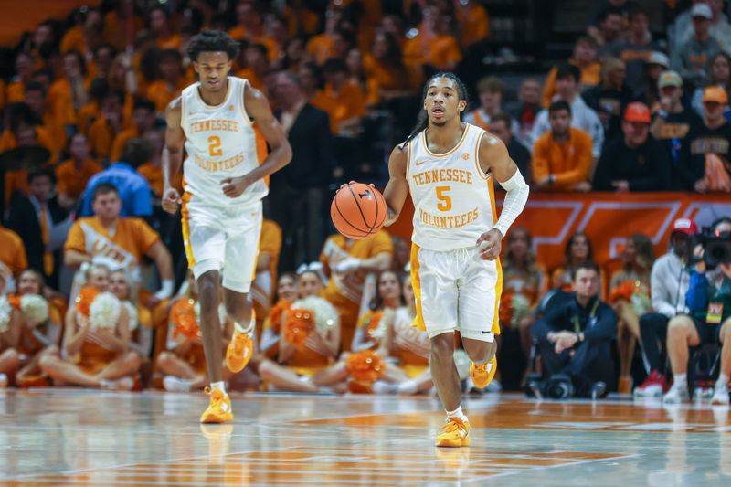 Nov 30, 2022; Knoxville, Tennessee, USA; Tennessee Volunteers guard Zakai Zeigler (5) brings the ball up court against the McNeese State Cowboys at Thompson-Boling Arena. Mandatory Credit: Randy Sartin-USA TODAY Sports