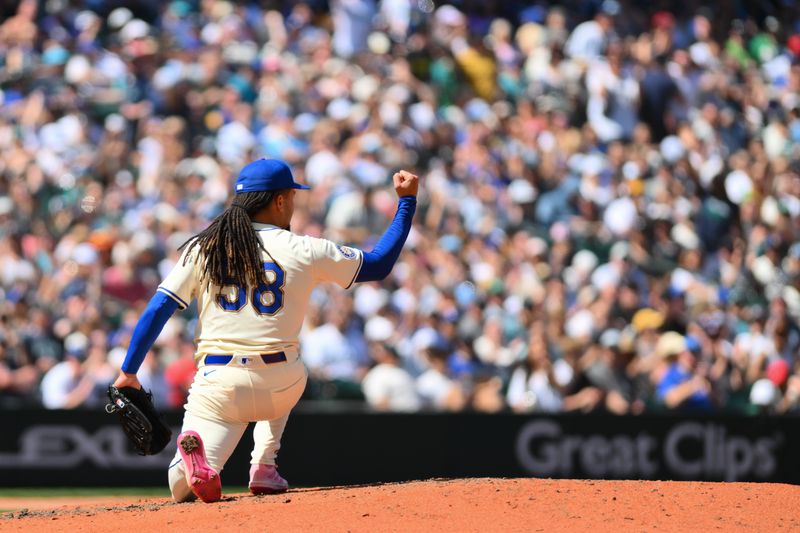 May 12, 2024; Seattle, Washington, USA; Seattle Mariners starting pitcher Luis Castillo (58) celebrates the final out against the Oakland Athletics during the sixth inning at T-Mobile Park. Mandatory Credit: Steven Bisig-USA TODAY Sports