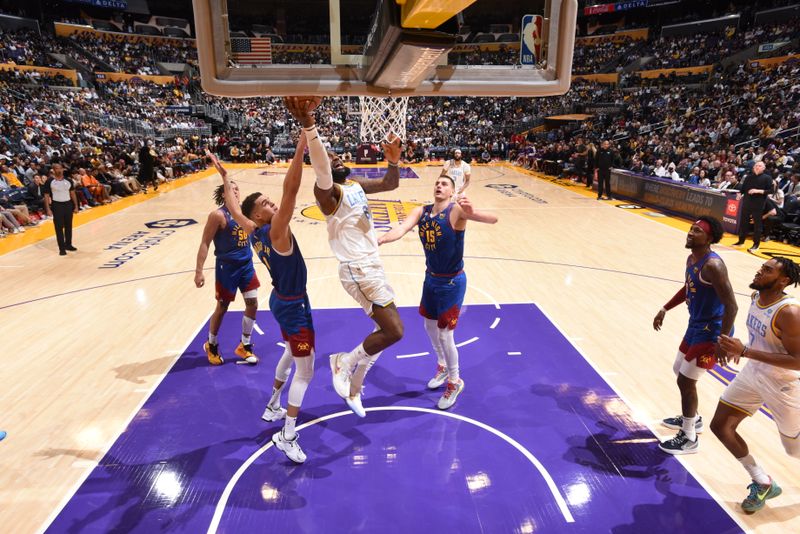 LOS ANGELES, CA - OCTOBER 30: LeBron James #6 of the Los Angeles Lakers drives to the basket during the game against the Denver Nuggets on October 30, 2022 at Crypto.Com Arena in Los Angeles, California. NOTE TO USER: User expressly acknowledges and agrees that, by downloading and/or using this Photograph, user is consenting to the terms and conditions of the Getty Images License Agreement. Mandatory Copyright Notice: Copyright 2022 NBAE (Photo by Andrew D. Bernstein/NBAE via Getty Images)