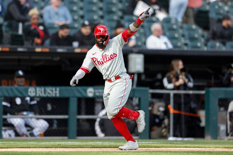 Apr 18, 2023; Chicago, Illinois, USA; Philadelphia Phillies second baseman Josh Harrison (2) rounds the bases after hitting a two-run home run against the Chicago White Sox during the seventh inning of game one of the doubleheader at Guaranteed Rate Field. Mandatory Credit: Kamil Krzaczynski-USA TODAY Sports