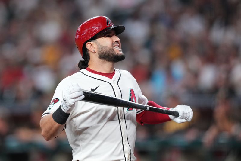 Sep 29, 2024; Phoenix, Arizona, USA; Arizona Diamondbacks third base Eugenio Suárez (28) reacts after striking out against the San Diego Padres during the second inning at Chase Field. Mandatory Credit: Joe Camporeale-Imagn Images