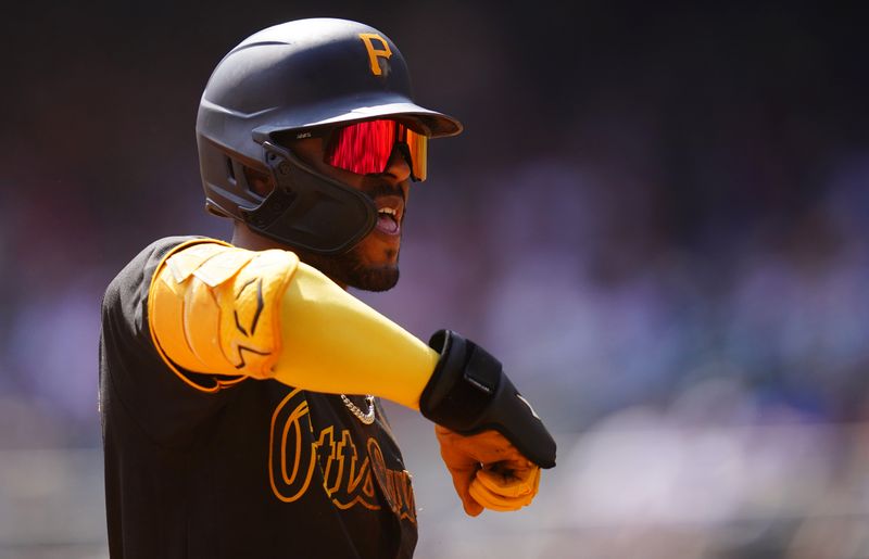 Sep 10, 2023; Cumberland, Georgia, USA; Pittsburgh Pirates right fielder Joshua Palacios (54) celebrates his triple against the Atlanta Braves during the seventh inning at Truist Park. Mandatory Credit: John David Mercer-USA TODAY Sports