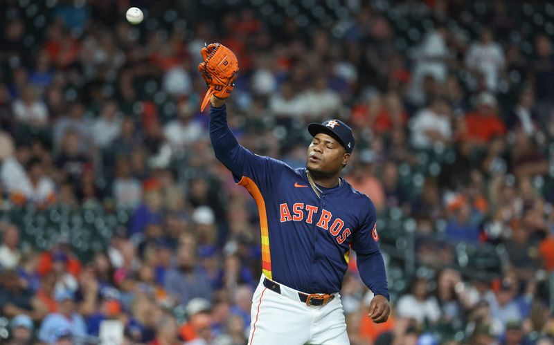 Apr 2, 2024; Houston, Texas, USA; Houston Astros starting pitcher Framber Valdez (59) reacts after a pitch during the third inning against the Toronto Blue Jays at Minute Maid Park. Mandatory Credit: Troy Taormina-USA TODAY Sports