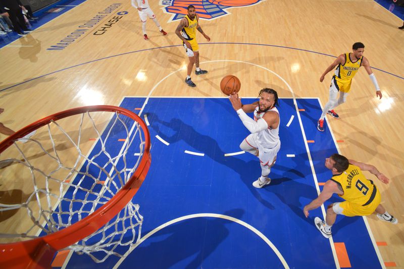 NEW YORK, NY - MAY 19: Jalen Brunson #11 of the New York Knicks drives to the basket during the game against the Indiana Pacers during Round 2 Game 7 of the 2024 NBA Playoffs on May 19, 2024 at Madison Square Garden in New York City, New York.  NOTE TO USER: User expressly acknowledges and agrees that, by downloading and or using this photograph, User is consenting to the terms and conditions of the Getty Images License Agreement. Mandatory Copyright Notice: Copyright 2024 NBAE  (Photo by Jesse D. Garrabrant/NBAE via Getty Images)