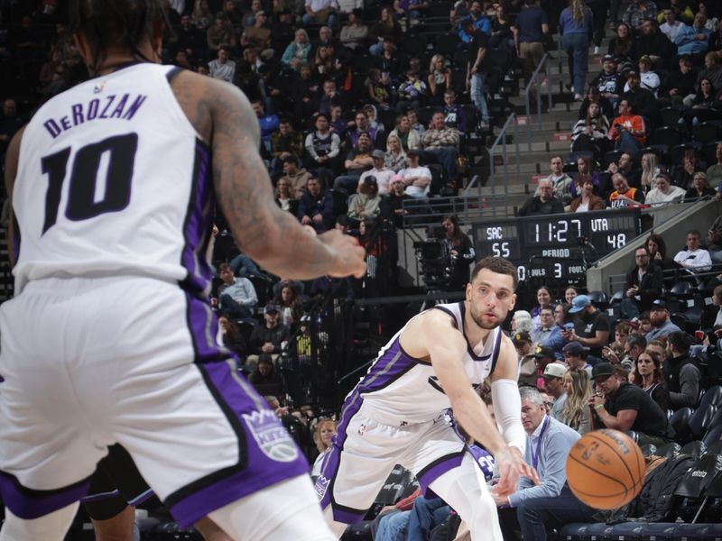 SALT LAKE CITY, UT - FEBRUARY 26:  Zach LaVine #8 of the Sacramento Kings passes the ball to DeMar DeRozan #10 during the game against the Utah Jazz on February 26, 2025 at Delta Center in Salt Lake City, Utah. NOTE TO USER: User expressly acknowledges and agrees that, by downloading and or using this Photograph, User is consenting to the terms and conditions of the Getty Images License Agreement. Mandatory Copyright Notice: Copyright 2025 NBAE (Photo by Melissa Majchrzak/NBAE via Getty Images)