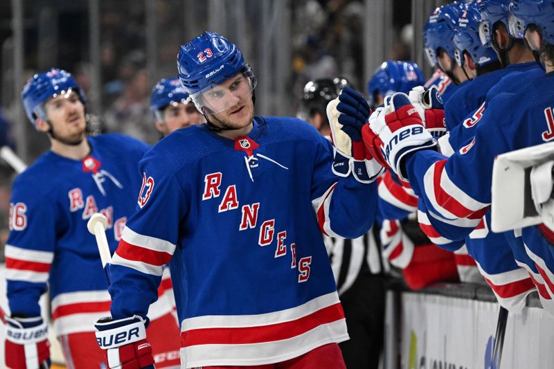 Mar 21, 2024; Boston, Massachusetts, USA; New York Rangers defenseman Adam Fox (23) reacts after scoring a goal against the Boston Bruins during the third period at the TD Garden. Mandatory Credit: Brian Fluharty-USA TODAY Sports