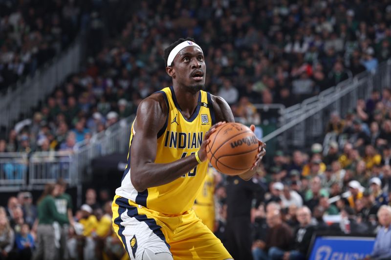 MILWAUKEE, WI - APRIL 21:  Pascal Siakam #43 of the Indiana Pacers shoots a free throw during the game against the Milwaukee Bucks during Round 1 Game 1 of the 2024 NBA Playoffs  on April 21, 2024 at the Fiserv Forum Center in Milwaukee, Wisconsin. NOTE TO USER: User expressly acknowledges and agrees that, by downloading and or using this Photograph, user is consenting to the terms and conditions of the Getty Images License Agreement. Mandatory Copyright Notice: Copyright 2024 NBAE (Photo by Jeff Haynes/NBAE via Getty Images).