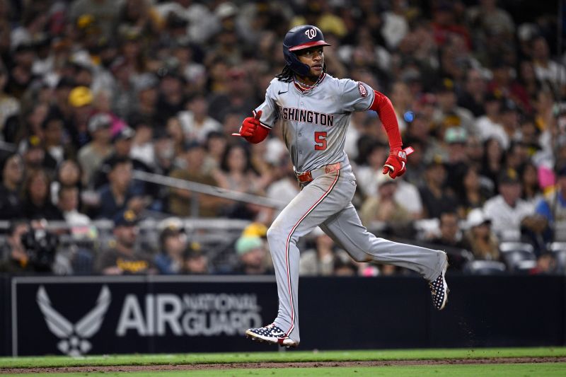 Jun 25, 2024; San Diego, California, USA; Washington Nationals shortstop CJ Abrams (5) advances home to score a run against the San Diego Padres during the eighth inning at Petco Park. Mandatory Credit: Orlando Ramirez-USA TODAY Sports