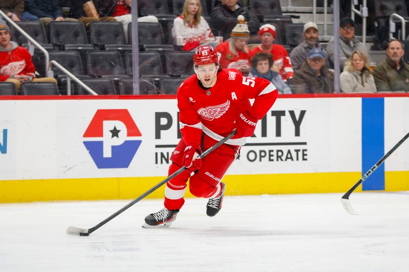 Jan 27, 2026; Detroit, Michigan, USA; Detroit Red Wings defenseman Moritz Seider (53) handles the puck during the first period against the Los Angeles Kings at Little Caesars Arena. Mandatory Credit: Brian Bradshaw Sevald-Imagn Images