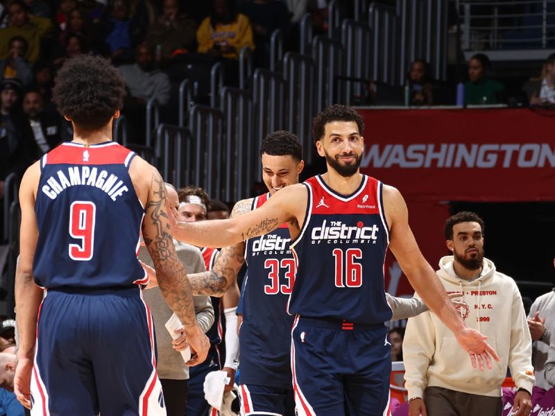 WASHINGTON, DC -? APRIL 4: Anthony Gill #16 of the Washington Wizards high fives Justin Champagnie #9 during the game against the Los Angeles Lakers on April 4, 2024 at Capital One Arena in Washington, DC. NOTE TO USER: User expressly acknowledges and agrees that, by downloading and or using this Photograph, user is consenting to the terms and conditions of the Getty Images License Agreement. Mandatory Copyright Notice: Copyright 2024 NBAE (Photo by Kenny Giarla/NBAE via Getty Images)