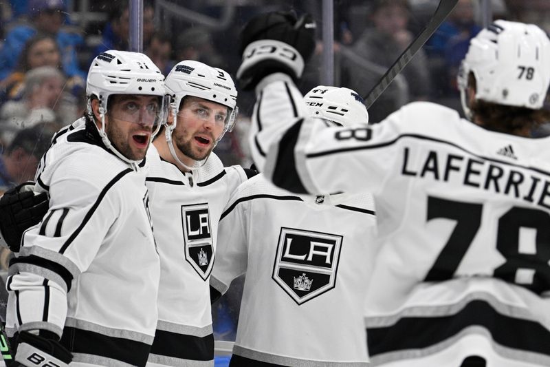 Jan 28, 2024; St. Louis, Missouri, USA; Los Angeles Kings right wing Adrian Kempe (9) is congratulated by teammates after scoring a goal against the St. Louis Blues during the first period at Enterprise Center. Mandatory Credit: Jeff Le-USA TODAY Sports