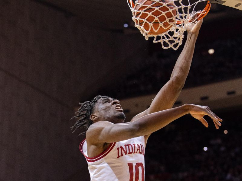 Dec 21, 2023; Bloomington, Indiana, USA; Indiana Hoosiers forward Kaleb Banks (10) dunks the ball in the first half against the North Alabama Lions at Simon Skjodt Assembly Hall. Mandatory Credit: Trevor Ruszkowski-USA TODAY Sports