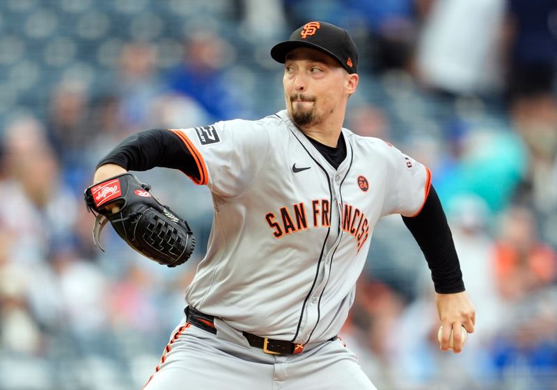 Sep 22, 2024; Kansas City, Missouri, USA; San Francisco Giants starting pitcher Blake Snell (7) pitches during the first inning against the Kansas City Royals at Kauffman Stadium. Mandatory Credit: Jay Biggerstaff-Imagn Images