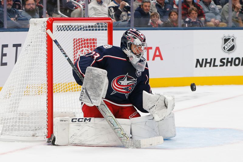 Oct 13, 2025; Columbus, Ohio, USA; Columbus Blue Jackets goalie Jet Greaves (73) makes a pad save against the New Jersey Devils during the second period at Nationwide Arena. Mandatory Credit: Russell LaBounty-Imagn Images