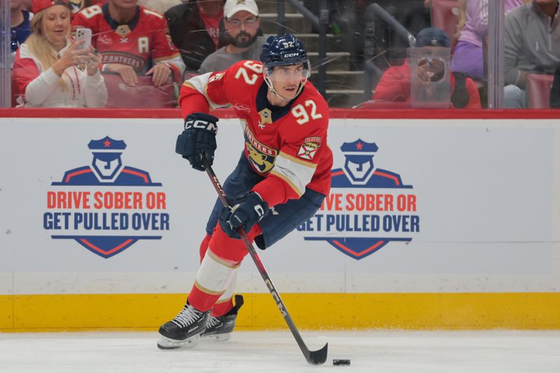 May 9, 2025; Sunrise, Florida, USA; Florida Panthers left wing Tomas Nosek (92) moves the puck against the Toronto Maple Leafs during the second period in game three of the second round of the 2025 Stanley Cup Playoffs at Amerant Bank Arena. Mandatory Credit: Sam Navarro-Imagn Images
