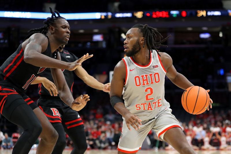 Jan 3, 2024; Columbus, Ohio, USA; Ohio State Buckeyes guard Bruce Thornton (2) dribbles the ball as Rutgers Scarlet Knights center Clifford Omoruyi (11) defends during the second half at Value City Arena. Mandatory Credit: Joseph Maiorana-USA TODAY Sports