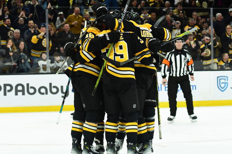 Mar 4, 2025; Boston, Massachusetts, USA; Boston Bruins center Morgan Geekie (39) celebrates his goal with his teammates during the third period against the Nashville Predators at TD Garden. Mandatory Credit: Bob DeChiara-Imagn Images
