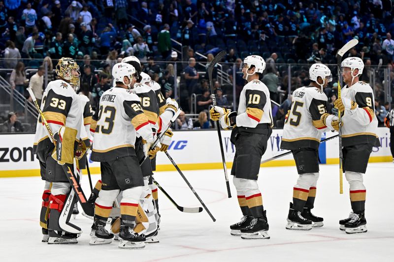 Oct 15, 2022; Seattle, Washington, USA; Vegas Golden Knights players celebrate after defeating the Seattle Kraken at Climate Pledge Arena. Mandatory Credit: Steven Bisig-USA TODAY Sports