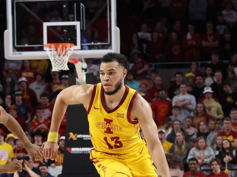 Feb 25, 2023; Ames, Iowa, USA; Iowa State Cyclones guard Jaren Holmes (13) drives against the Iowa State Cyclones during the second half at James H. Hilton Coliseum. Mandatory Credit: Reese Strickland-USA TODAY Sports