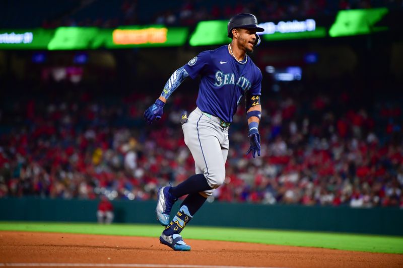 Aug 30, 2024; Anaheim, California, USA; Seattle Mariners center fielder Julio Rodríguez (44) runs the bases after hitting a two run home run against the Los Angeles Angels at Angel Stadium. Mandatory Credit: Gary A. Vasquez-USA TODAY Sports