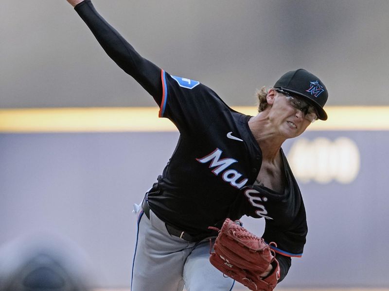 Jul 27, 2024; Milwaukee, Wisconsin, USA;  Miami Marlins pitcher Max Meyer (23) throws a pitch during the first inning against the Milwaukee Brewers at American Family Field. Mandatory Credit: Jeff Hanisch-USA TODAY Sports