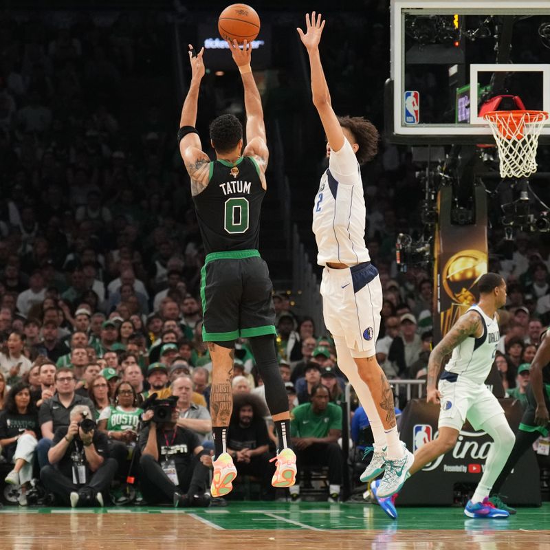 BOSTON, MA - JUNE 9: Jayson Tatum #0 of the Boston Celtics shoots the ball during the game against the Dallas Mavericks during Game 2 of the 2024 NBA Finals on June 9, 2024 at the TD Garden in Boston, Massachusetts. NOTE TO USER: User expressly acknowledges and agrees that, by downloading and or using this photograph, User is consenting to the terms and conditions of the Getty Images License Agreement. Mandatory Copyright Notice: Copyright 2024 NBAE  (Photo by Jesse D. Garrabrant/NBAE via Getty Images)