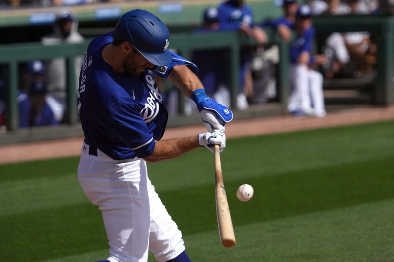 Feb 25, 2024; Phoenix, Arizona, USA; Los Angeles Dodgers second baseman Chris Taylor (3) bats against the Oakland Athletics during the first inning at Camelback Ranch-Glendale. Mandatory Credit: Joe Camporeale-USA TODAY Sports