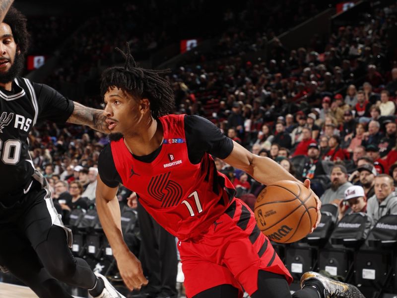 PORTLAND, OR - DECEMBER 13: Shaedon Sharpe #17 of the Portland Trail Blazers drives to the basket during the game against the San Antonio Spurs on December 13, 2024 at the Moda Center Arena in Portland, Oregon. NOTE TO USER: User expressly acknowledges and agrees that, by downloading and or using this photograph, user is consenting to the terms and conditions of the Getty Images License Agreement. Mandatory Copyright Notice: Copyright 2024 NBAE (Photo by Cameron Browne/NBAE via Getty Images)