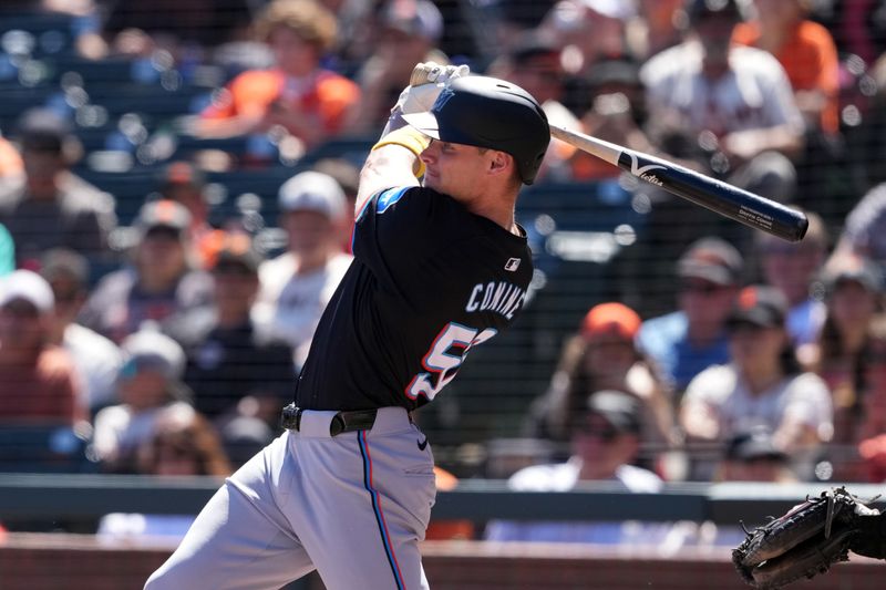 Sep 1, 2024; San Francisco, California, USA; Miami Marlins right fielder Griffin Conine (56) hits a single against the San Francisco Giants during the fifth inning at Oracle Park. Mandatory Credit: Darren Yamashita-USA TODAY Sports