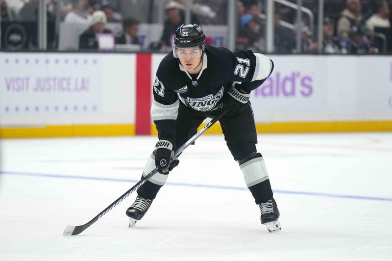 Nov 27, 2024; Los Angeles, California, USA; LA Kings defenseman Jordan Spence (21) against the Winnipeg Jets in the second period at Crypto.com Arena. Mandatory Credit: Kirby Lee-Imagn Images