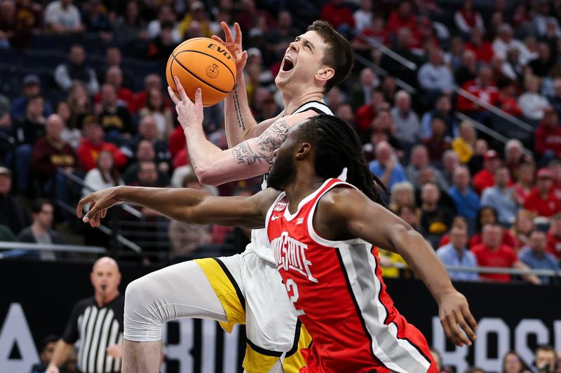 Mar 14, 2024; Minneapolis, MN, USA; Iowa Hawkeyes forward Patrick McCaffery (22) shoots as Ohio State Buckeyes guard Bruce Thornton (2) defends during the first half at Target Center. Mandatory Credit: Matt Krohn-USA TODAY Sports