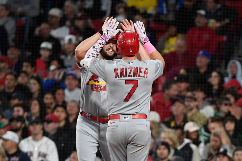 May 14, 2023; Boston, Massachusetts, USA; St. Louis Cardinals catcher Andrew Knizner (7) celebrates his two run home run against the Boston Red Sox with left fielder Alec Burleson (41) during the fourth inning at Fenway Park. Mandatory Credit: Eric Canha-USA TODAY Sports