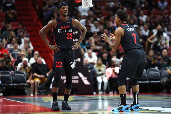 MIAMI, FLORIDA - NOVEMBER 03: Jimmy Butler #22 and Kyle Lowry #7 of the Miami Heat speak on the court in the first quarter against the Washington Wizards during the NBA In-Season Tournament at Kaseya Center on November 03, 2023 in Miami, Florida. NOTE TO USER: User expressly acknowledges and agrees that, by downloading and or using this photograph, User is consenting to the terms and conditions of the Getty Images License Agreement. (Photo by Megan Briggs/Getty Images)