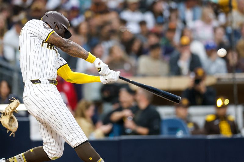 Apr 12, 2025; San Diego, California, USA; San Diego Padres left fielder Jason Heyward (22) hits a one-run home run during the fifth inning against the Colorado Rockies at Petco Park. Mandatory Credit: David Frerker-Imagn Images
