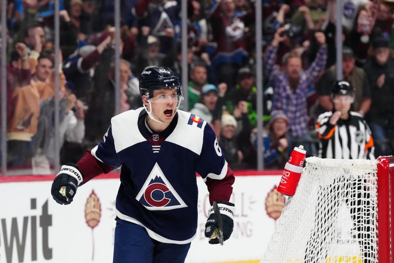 Apr 7, 2024; Denver, Colorado, USA; Colorado Avalanche left wing Artturi Lehkonen (62) celebrates his goal scored in the second period against the Dallas Stars at Ball Arena. Mandatory Credit: Ron Chenoy-USA TODAY Sports