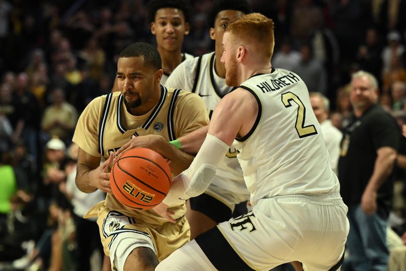 Feb 11, 2023; Winston-Salem, North Carolina, USA; Georgia Tech Yellow Jackets guard Kyle Sturdivant (1) and Wake Forest Demon Deacons guard Cameron Hildreth (2) battle for an inbounds ball in the second half at Lawrence Joel Veterans Memorial Coliseum. Mandatory Credit: William Howard-USA TODAY Sports