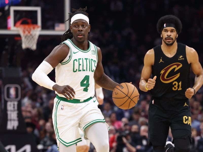 CLEVELAND, OH - MARCH 5: Jrue Holiday #4 of the Boston Celtics dribbles the ball during the game against the Cleveland Cavaliers on March 5, 2024 at Rocket Mortgage FieldHouse in Cleveland, Ohio. NOTE TO USER: User expressly acknowledges and agrees that, by downloading and/or using this Photograph, user is consenting to the terms and conditions of the Getty Images License Agreement. Mandatory Copyright Notice: Copyright 2024 NBAE (Photo by Lauren Leigh Bacho<p><br/></p>/NBAE via Getty Images)