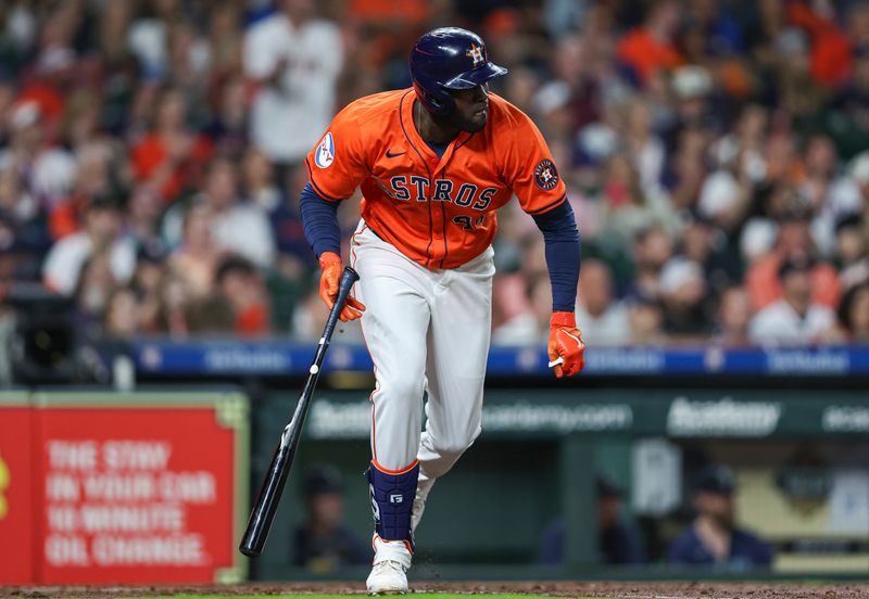 May 3, 2024; Houston, Texas, USA; Houston Astros designated hitter Yordan Alvarez (44) hits a double during the fourth inning against the Seattle Mariners at Minute Maid Park. Mandatory Credit: Troy Taormina-USA TODAY Sports