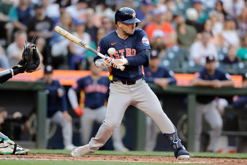 Jul 20, 2024; Seattle, Washington, USA; Houston Astros third baseman Alex Bregman (2) is hit by a pitch from Seattle Mariners starting pitcher George Kirby (not pictured)  during the fourth inning at T-Mobile Park. Mandatory Credit: John Froschauer-USA TODAY Sports