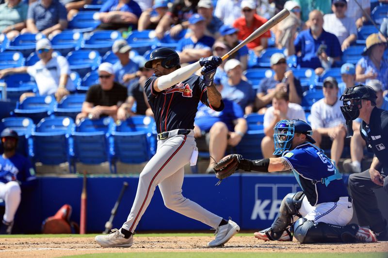 Mar 10, 2026; Dunedin, Florida, USA;  Atlanta Braves outfielder Jose Azocar (37) triples during the fourth inning against the Toronto Blue Jays at TD Ballpark. Mandatory Credit: Kim Klement Neitzel-Imagn Images