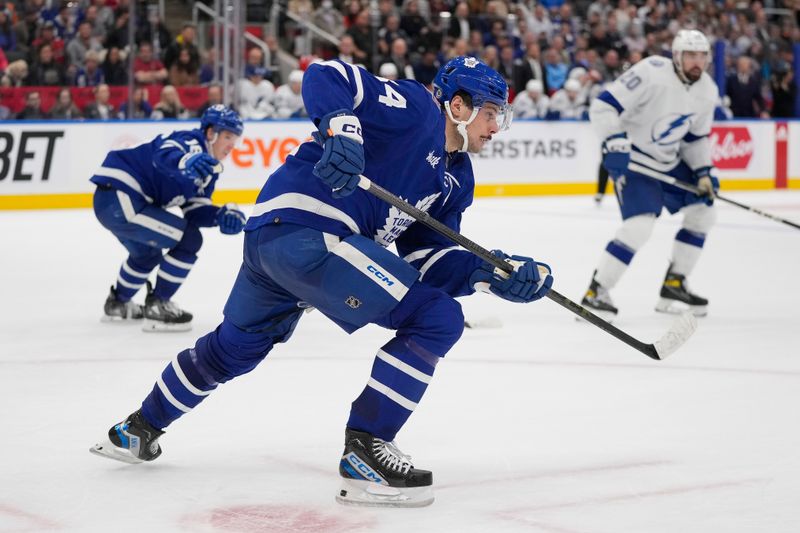 Nov 6, 2023; Toronto, Ontario, CAN; Toronto Maple Leafs forward Auston Matthews (34) skates against the Tampa Bay Lightning during the third period at Scotiabank Arena. Mandatory Credit: John E. Sokolowski-USA TODAY Sports