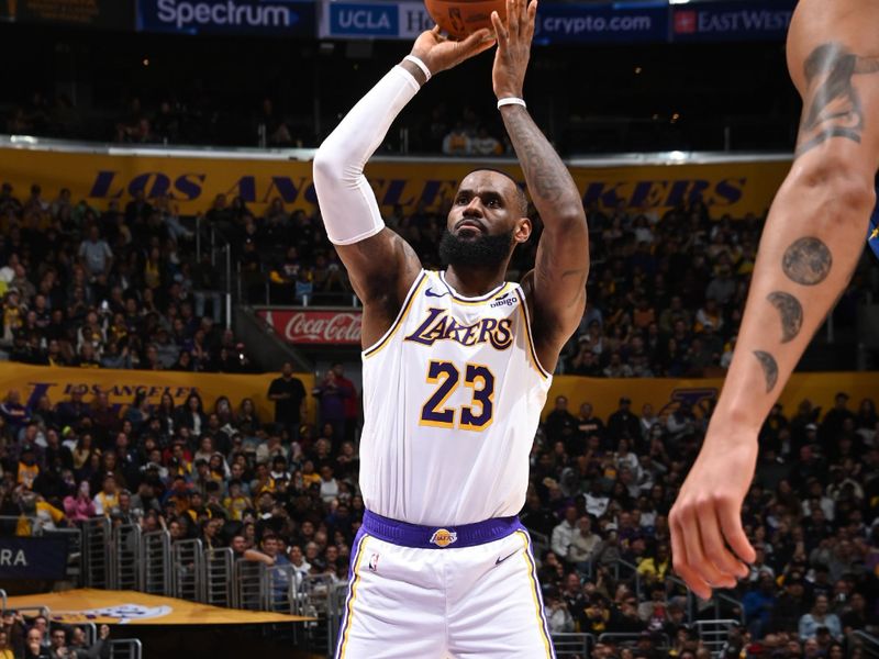 LOS ANGELES, CA - MARCH 2: LeBron James #23 of the Los Angeles Lakers shoots a free throw during the game against the Denver Nuggets on March 2, 2024 at Crypto.Com Arena in Los Angeles, California. NOTE TO USER: User expressly acknowledges and agrees that, by downloading and/or using this Photograph, user is consenting to the terms and conditions of the Getty Images License Agreement. Mandatory Copyright Notice: Copyright 2024 NBAE (Photo by Andrew D. Bernstein/NBAE via Getty Images)