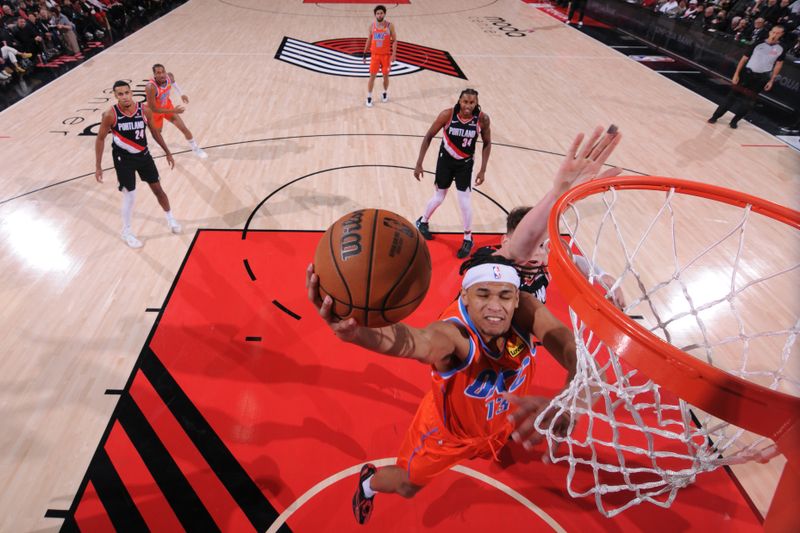 PORTLAND, OR - NOVEMBER 1: Ousmane Dieng #13 of the Oklahoma City Thunder drives to the basket during the game against the Portland Trail Blazers on November 1, 2024 at the Moda Center Arena in Portland, Oregon. NOTE TO USER: User expressly acknowledges and agrees that, by downloading and or using this photograph, user is consenting to the terms and conditions of the Getty Images License Agreement. Mandatory Copyright Notice: Copyright 2024 NBAE (Photo by Cameron Browne/NBAE via Getty Images)