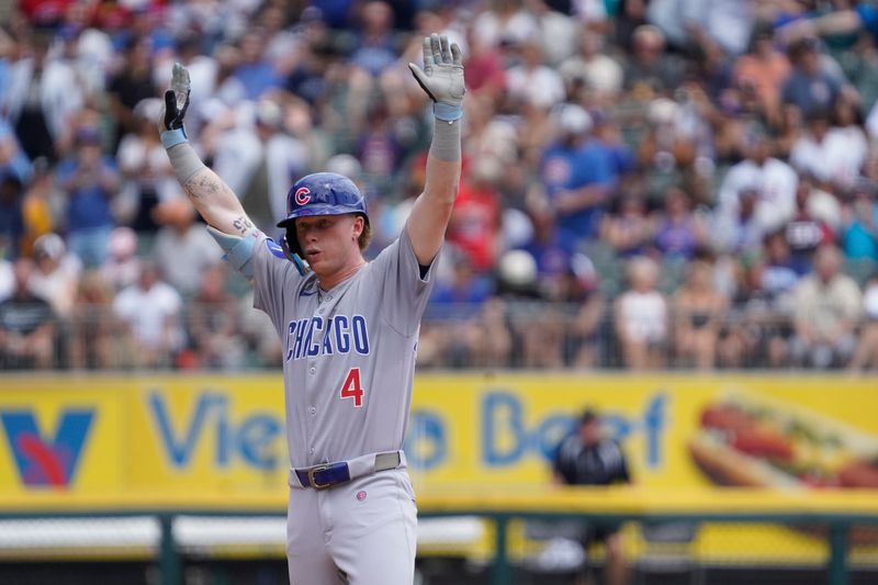 Jul 27, 2025; Chicago, Illinois, USA; Chicago Cubs outfielder Pete Crow-Armstrong (4) gestures after hitting a double against the Chicago White Sox during the third inning at Rate Field. Mandatory Credit: David Banks-Imagn Images