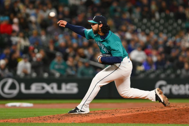 Apr 27, 2024; Seattle, Washington, USA; Seattle Mariners relief pitcher Andres Munoz (75) pitches to the Arizona Diamondbacks during the ninth inning at T-Mobile Park. Mandatory Credit: Steven Bisig-USA TODAY Sports