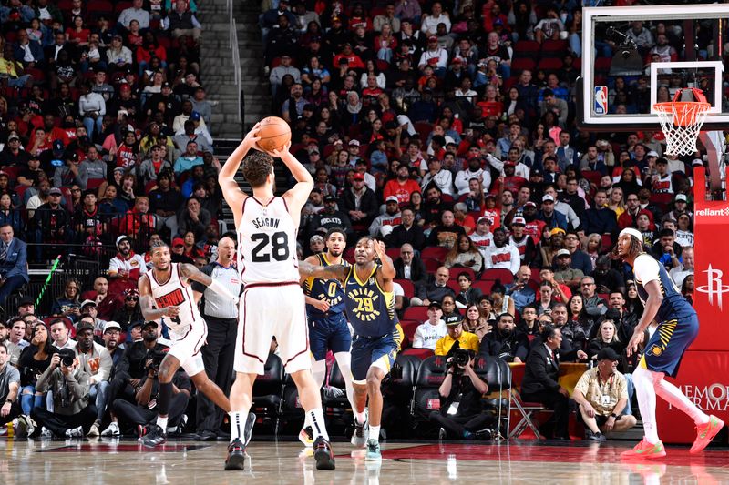 HOUSTON, TX - NOVEMBER 20: Alperen Sengun #28 of the Houston Rockets shoots a three point basket during the game against the Indiana Pacers  on November 20, 2024 at the Toyota Center in Houston, Texas. NOTE TO USER: User expressly acknowledges and agrees that, by downloading and or using this photograph, User is consenting to the terms and conditions of the Getty Images License Agreement. Mandatory Copyright Notice: Copyright 2024 NBAE (Photo by Logan Riely/NBAE via Getty Images)