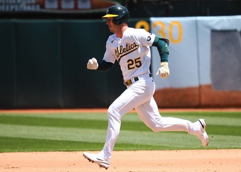 May 31, 2023; Oakland, California, USA; Oakland Athletics left fielder Brett Rooker (25) runs to second base for a double against the Atlanta Braves during the sixth inning at Oakland-Alameda County Coliseum. Mandatory Credit: Kelley L Cox-USA TODAY Sports