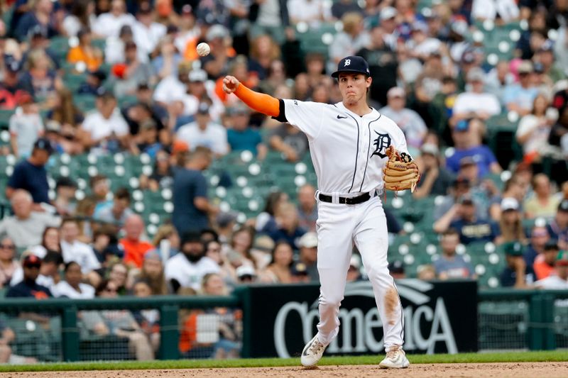 Aug 6, 2023; Detroit, Michigan, USA; Detroit Tigers third baseman Nick Maton (9) makes a throw during the fourth inning against the Tampa Bay Rays at Comerica Park. Mandatory Credit: Rick Osentoski-USA TODAY Sports