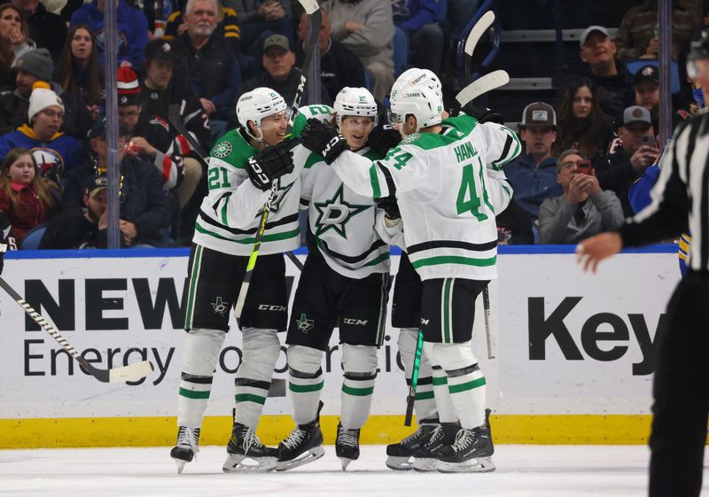 Mar 9, 2023; Buffalo, New York, USA;  Dallas Stars left wing Joel Kiviranta (25) celebrates his goal with teammates during the second period against the Buffalo Sabres at KeyBank Center. Mandatory Credit: Timothy T. Ludwig-USA TODAY Sports